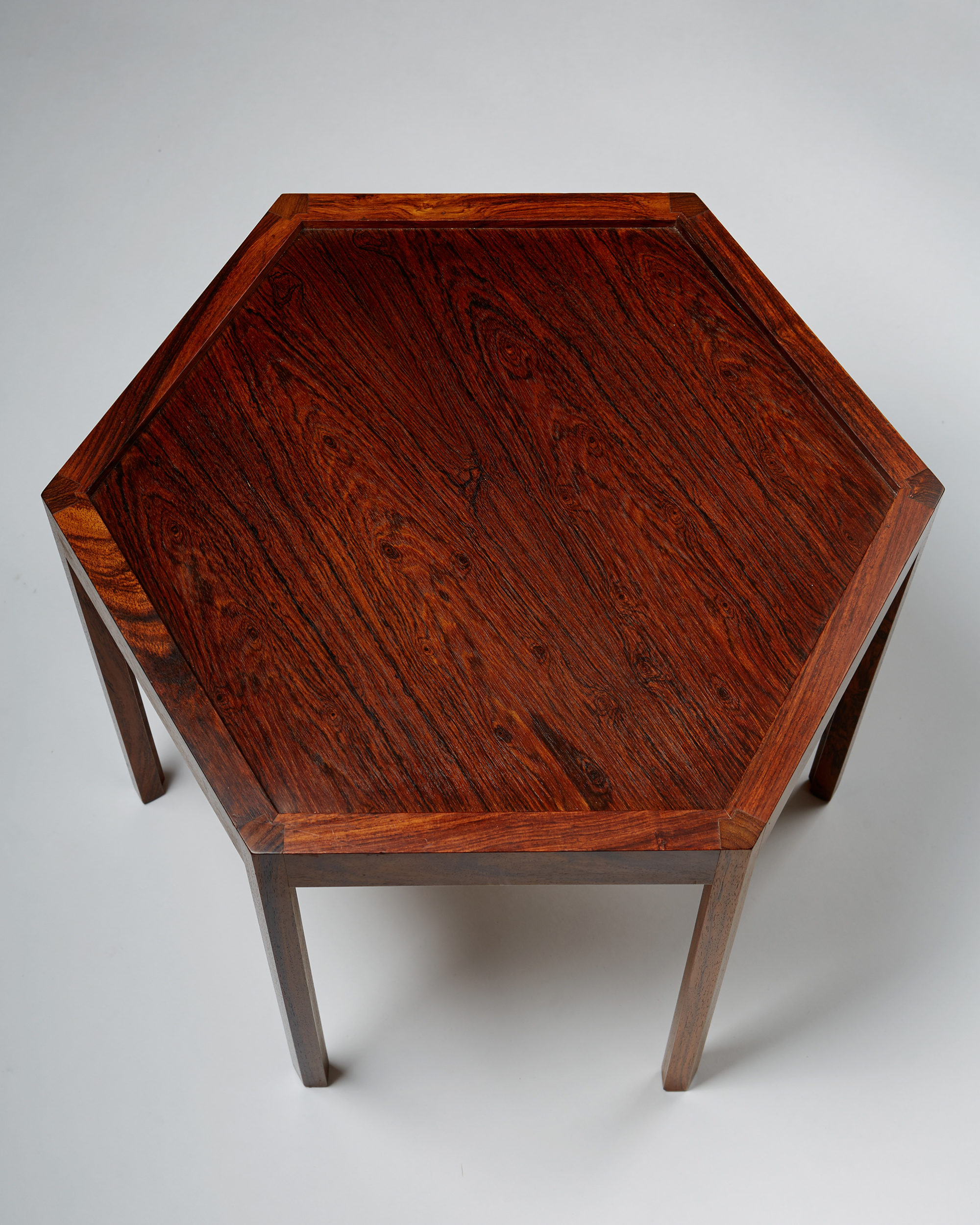 Hexagonal occasional table designed by Hans Andersen, — Modernity