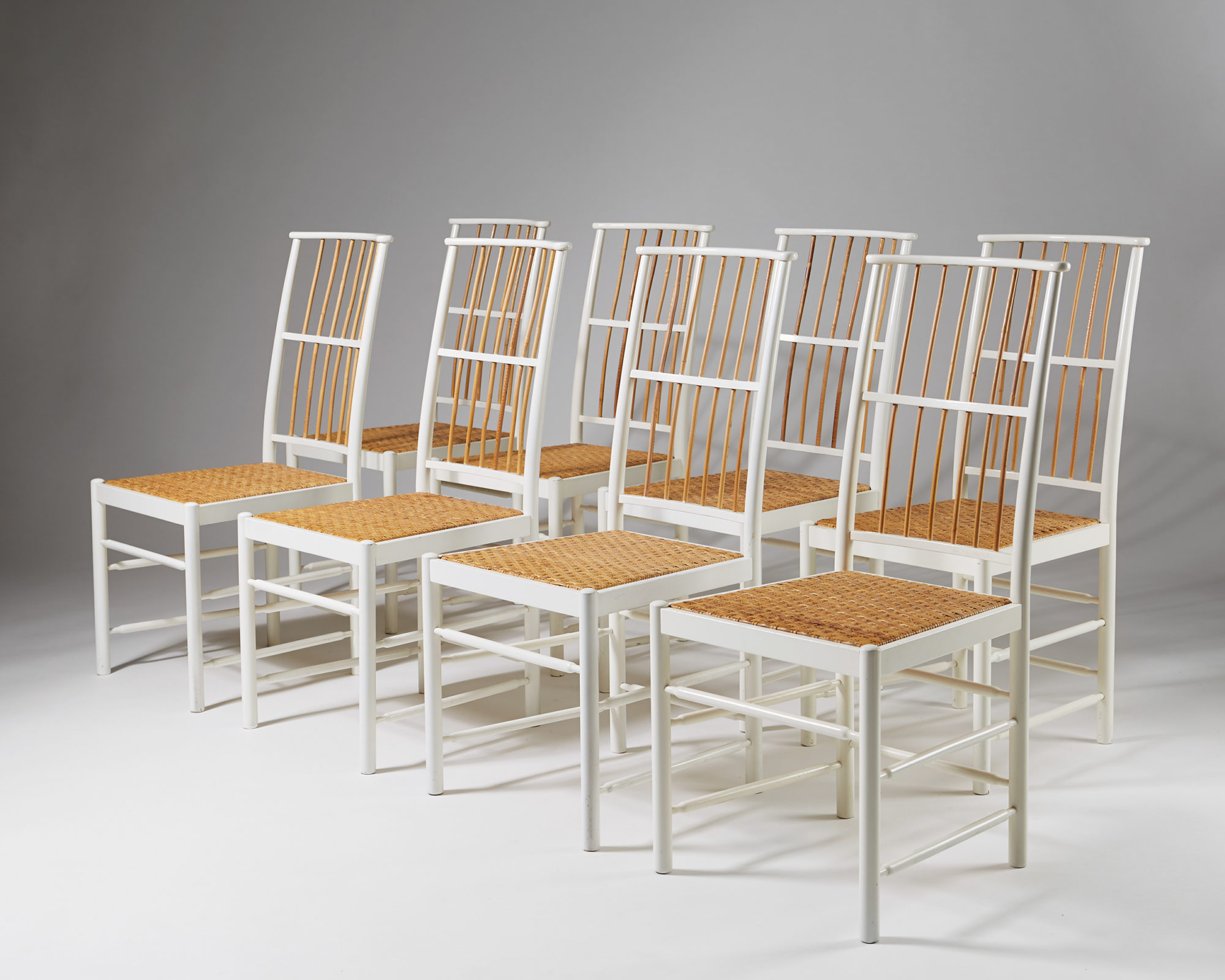 Set of eight dining chairs model 2025 designed by Josef Frank for