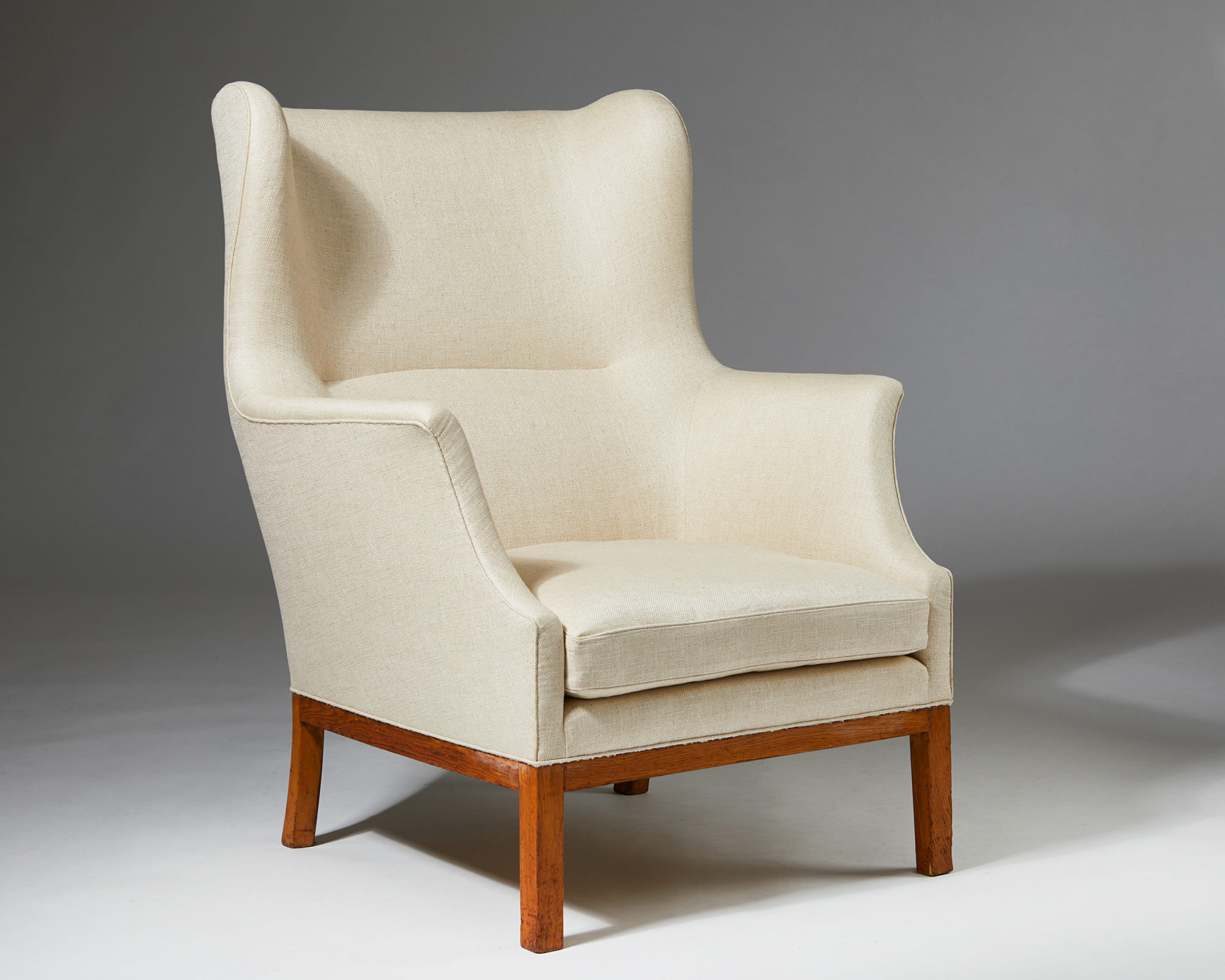 Highback wing chair designed by Mogens Koch for FR. Smiths Sönner