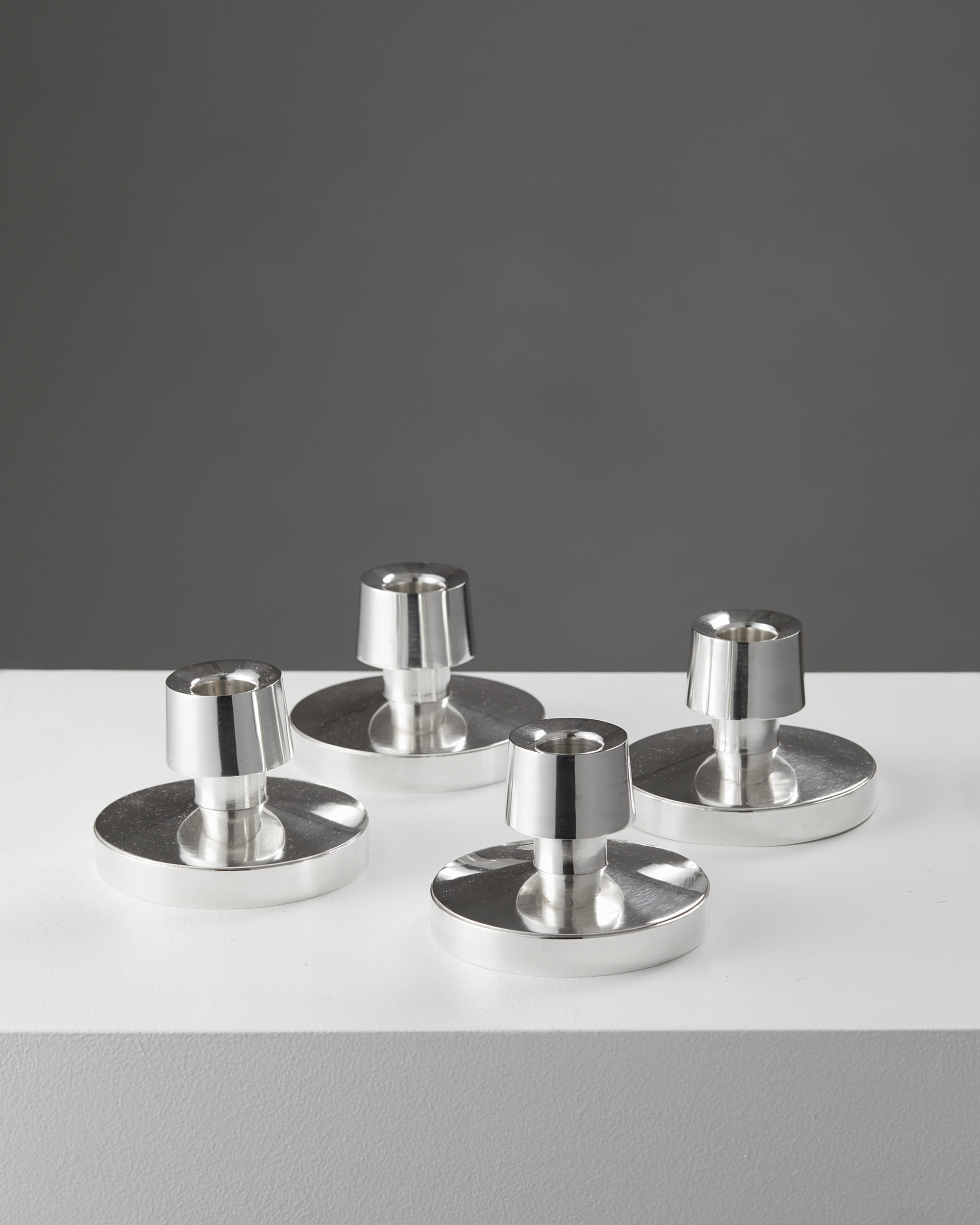 Set of four candlesticks, designed by Rey Urban, — Modernity