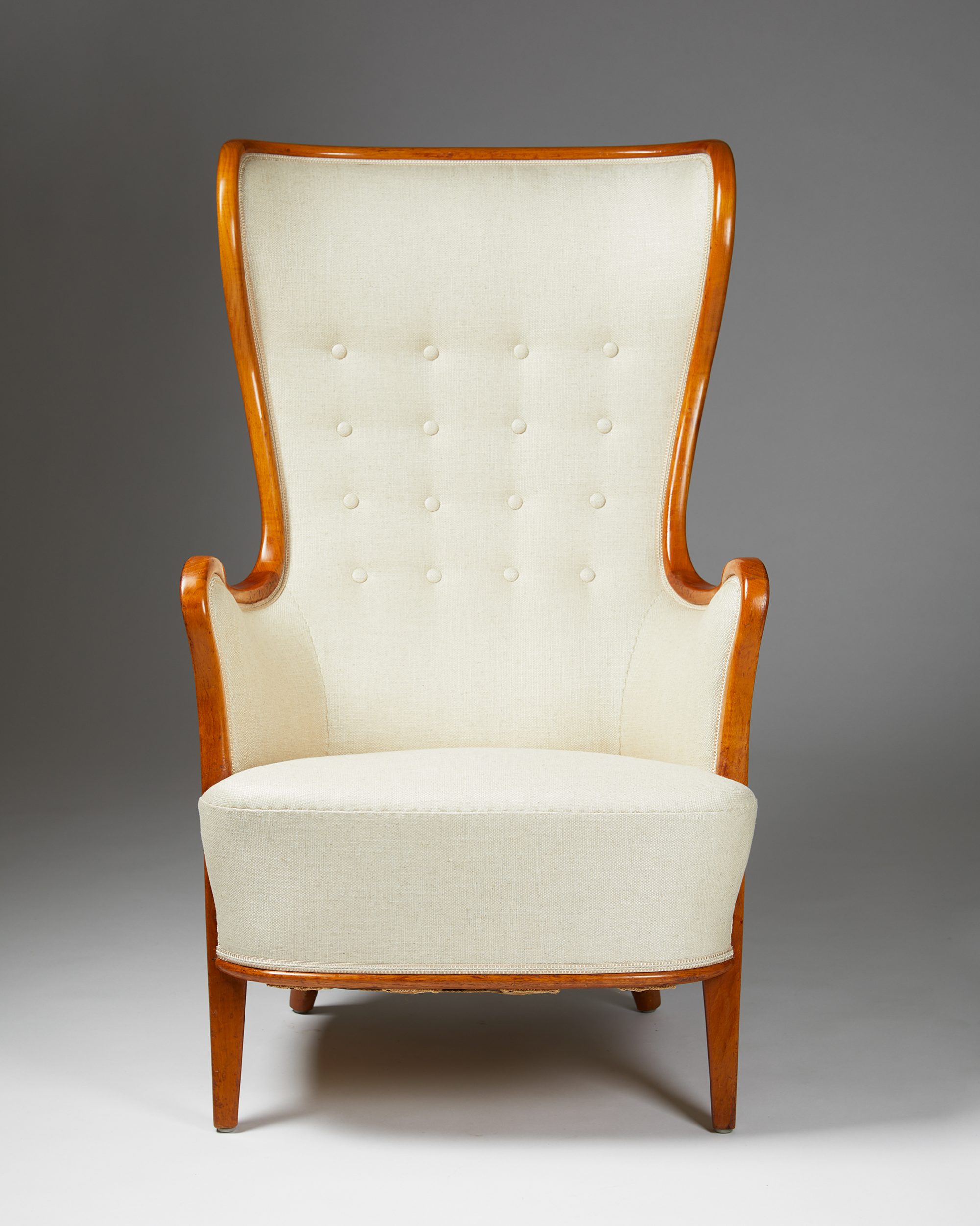 Pair of highback easy chairs designed by Axel Larsson, — Modernity